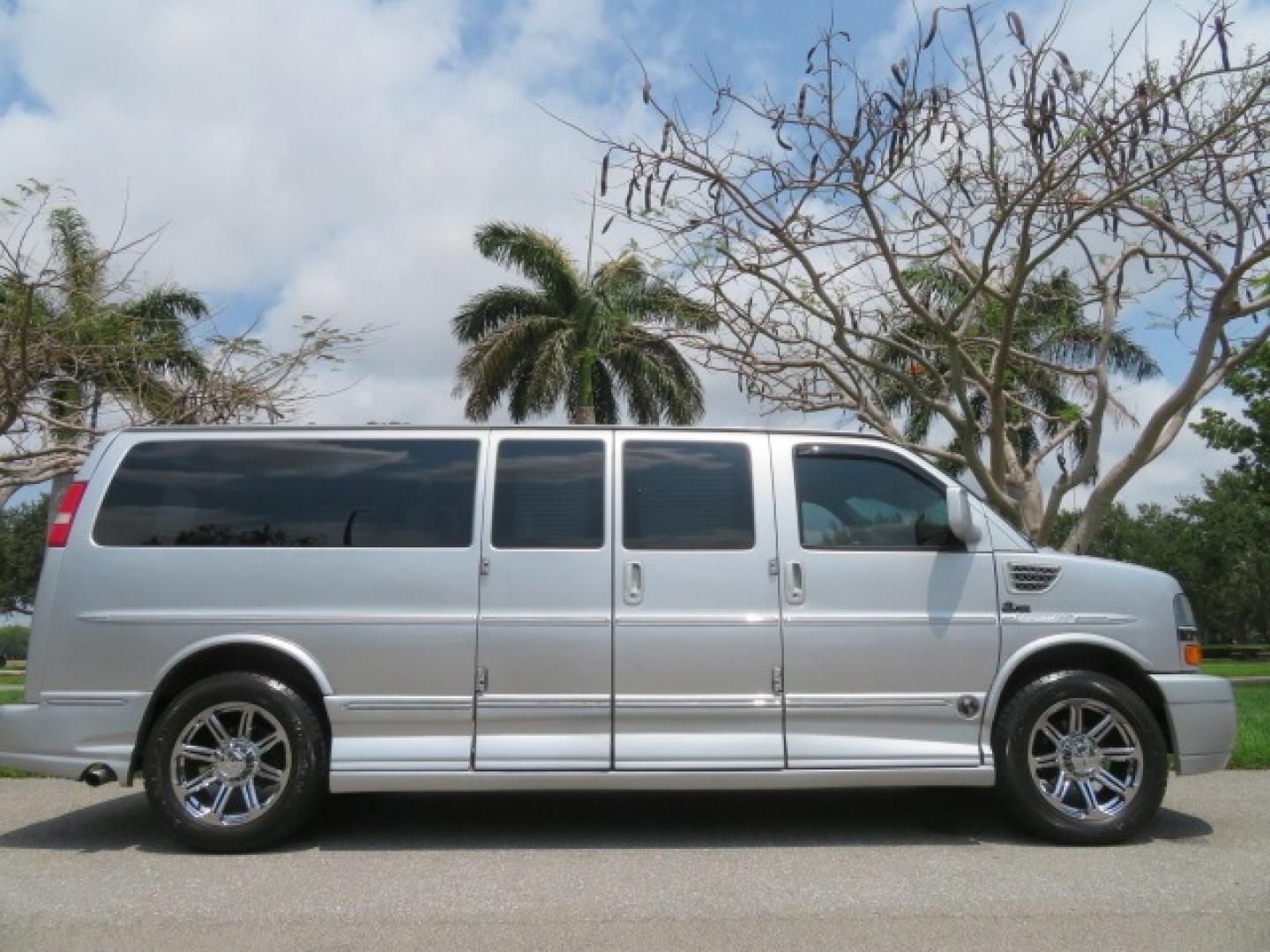 2014 Chevrolet Express (1GBWGLCG3E1) , located at 4301 Oak Circle #19, Boca Raton, FL, 33431, (954) 561-2499, 26.388861, -80.084038 - You are looking at a Rare 2014 Chevy Express 2500 Quigley 4x4 Four Wheel Drive Explorer Limited SE 9 Passenger Conversion Van with: 107K Original Miles, 6 Captain Chairs, Rear Power Folding Bench Seat Bed, Center Consoler Cooler, Front PPF (Paint Protection Film) Explorer Limited Conversion Througho - Photo#5